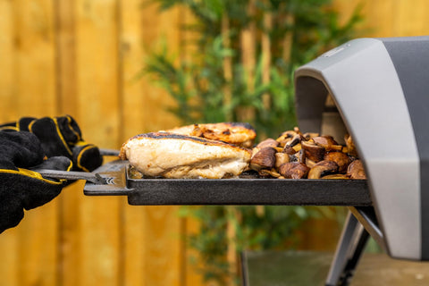Ooni oven-safe pan suitable for pizza ovens, open fires, and stoves.