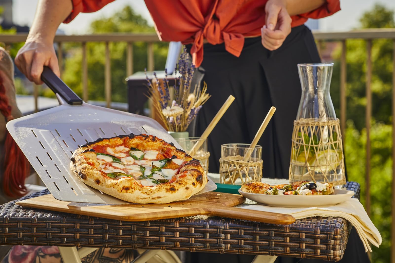 Ooni perforated pizza peel storage-ready design keeps counters clear.