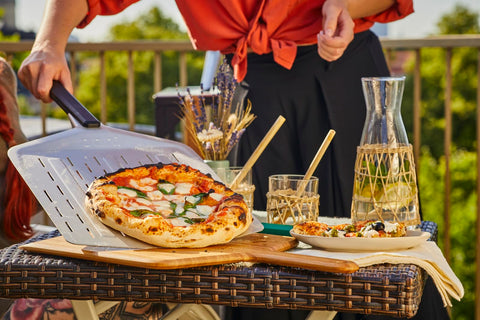Ooni perforated pizza peel storage-ready design keeps counters clear.