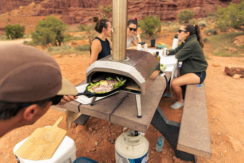 Ooni Sizzler Pan removable handle facilitates transfer to the table.