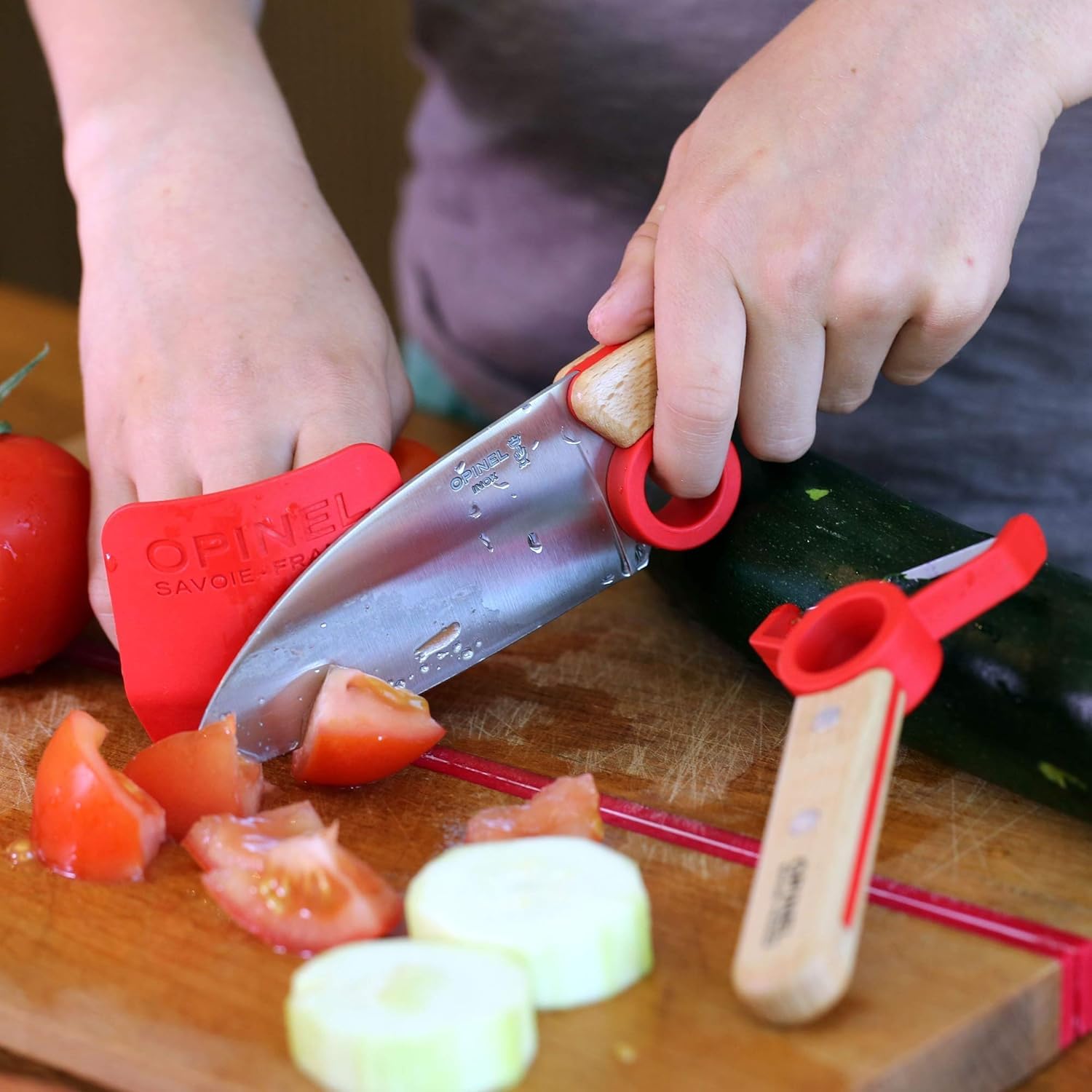 OPINEL kid-friendly knife safety practice in a real kitchen.