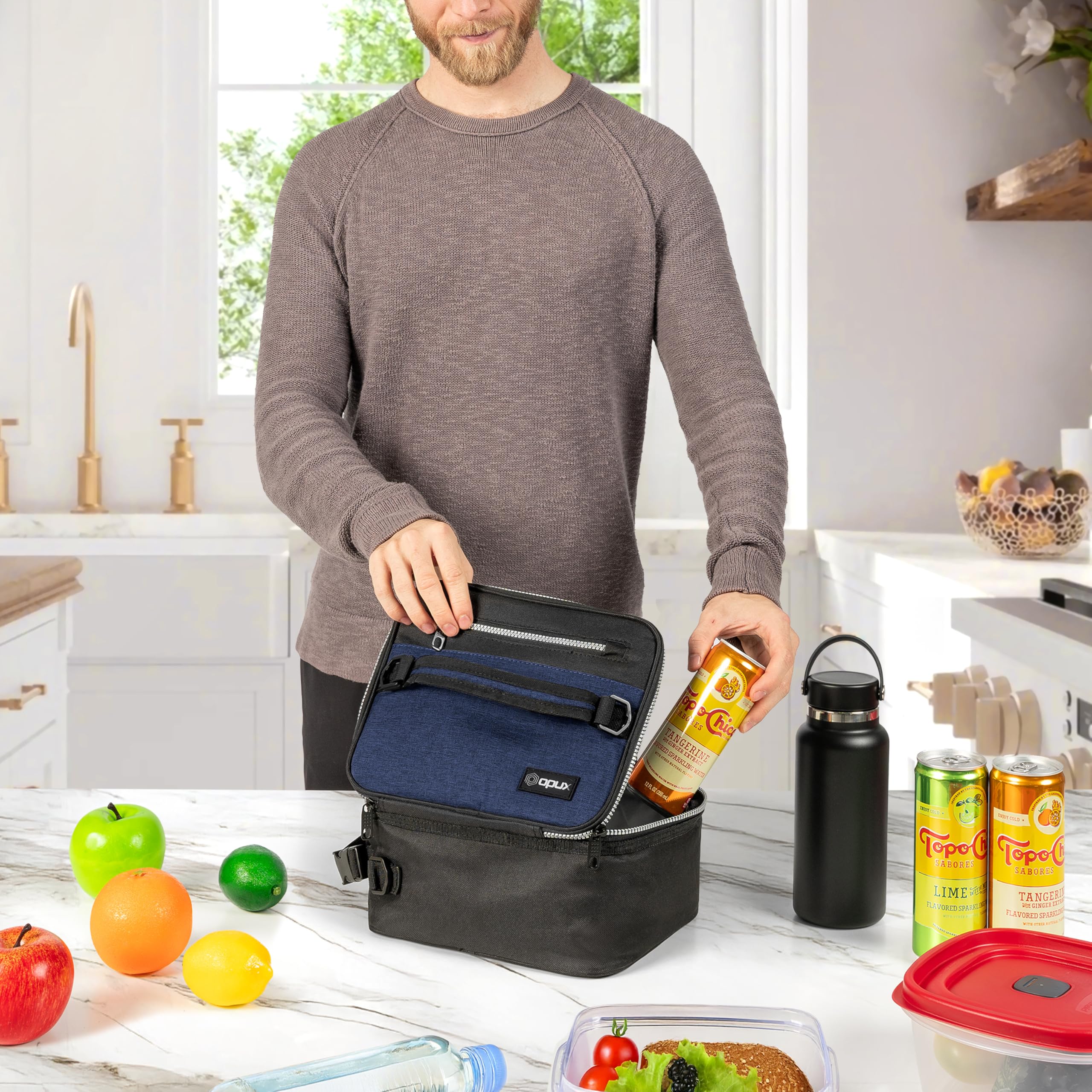 OPUX insulated lunch bag inner mesh pocket keeps utensils organized.