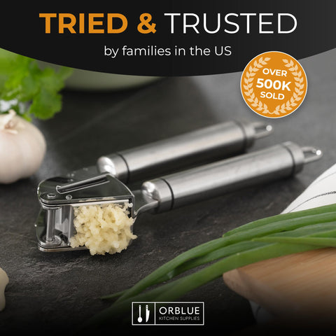 Orblue garlic press multi-colored handles add lively kitchen look