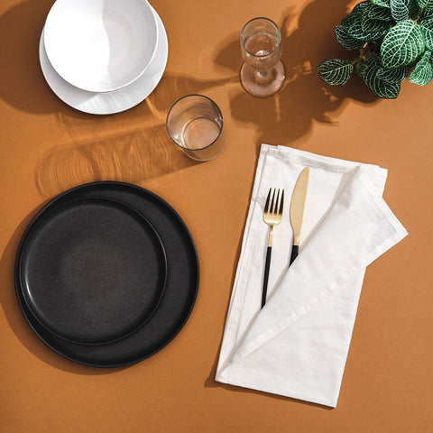 Organic Cotton Mart off-white flour sack towels stacked, unbleached and chemical-free for safe food prep.
