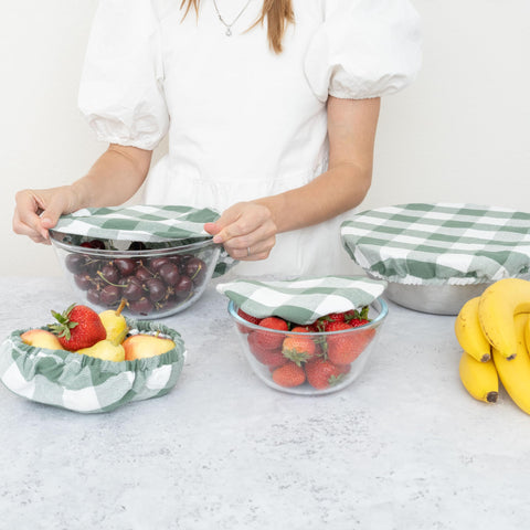 Organic Cotton Mart sage green bowl cover for 4.5-inch bowls, flexible fit.