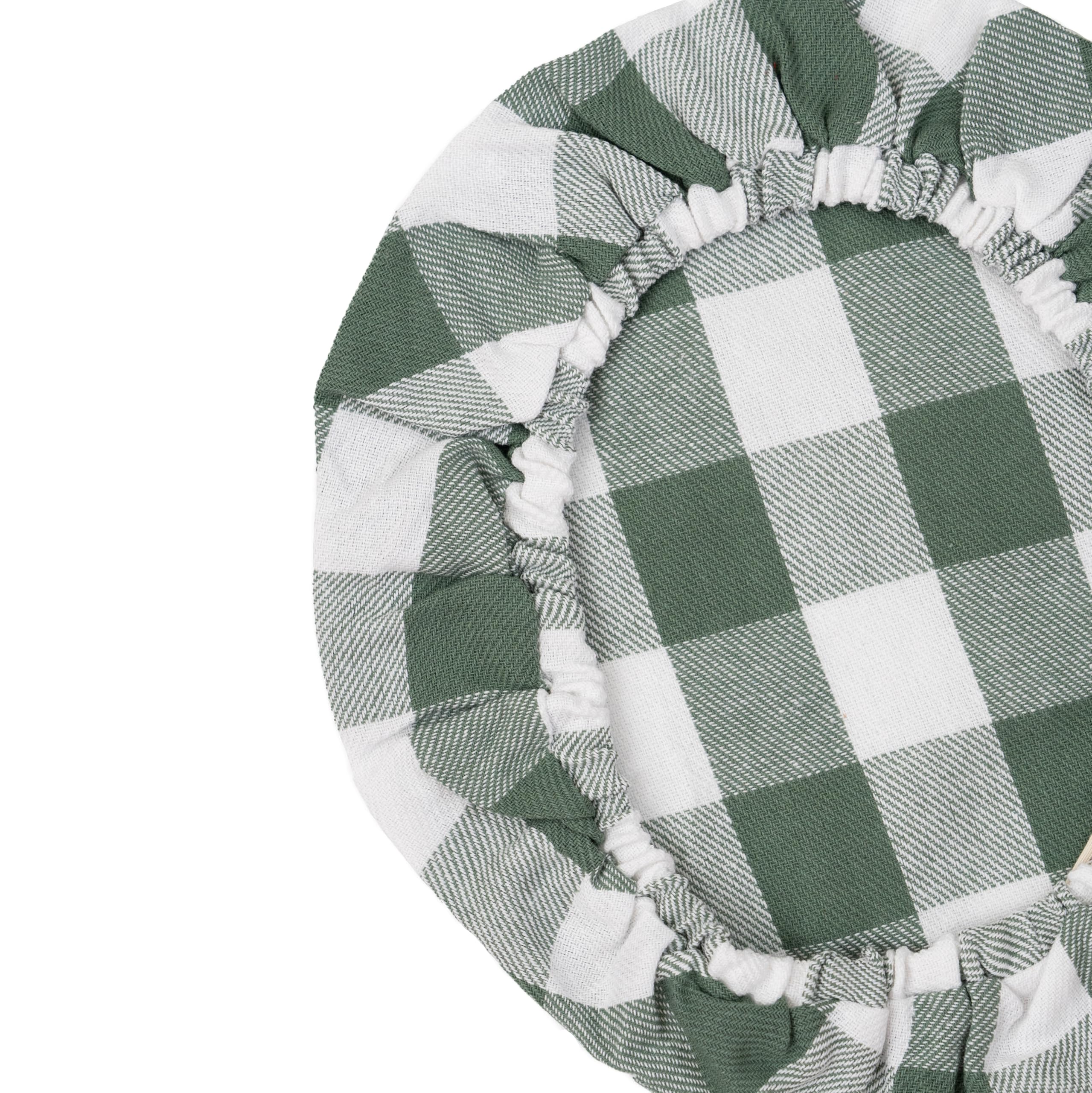Organic Cotton Mart sage green picnic cover keeps dishes protected.