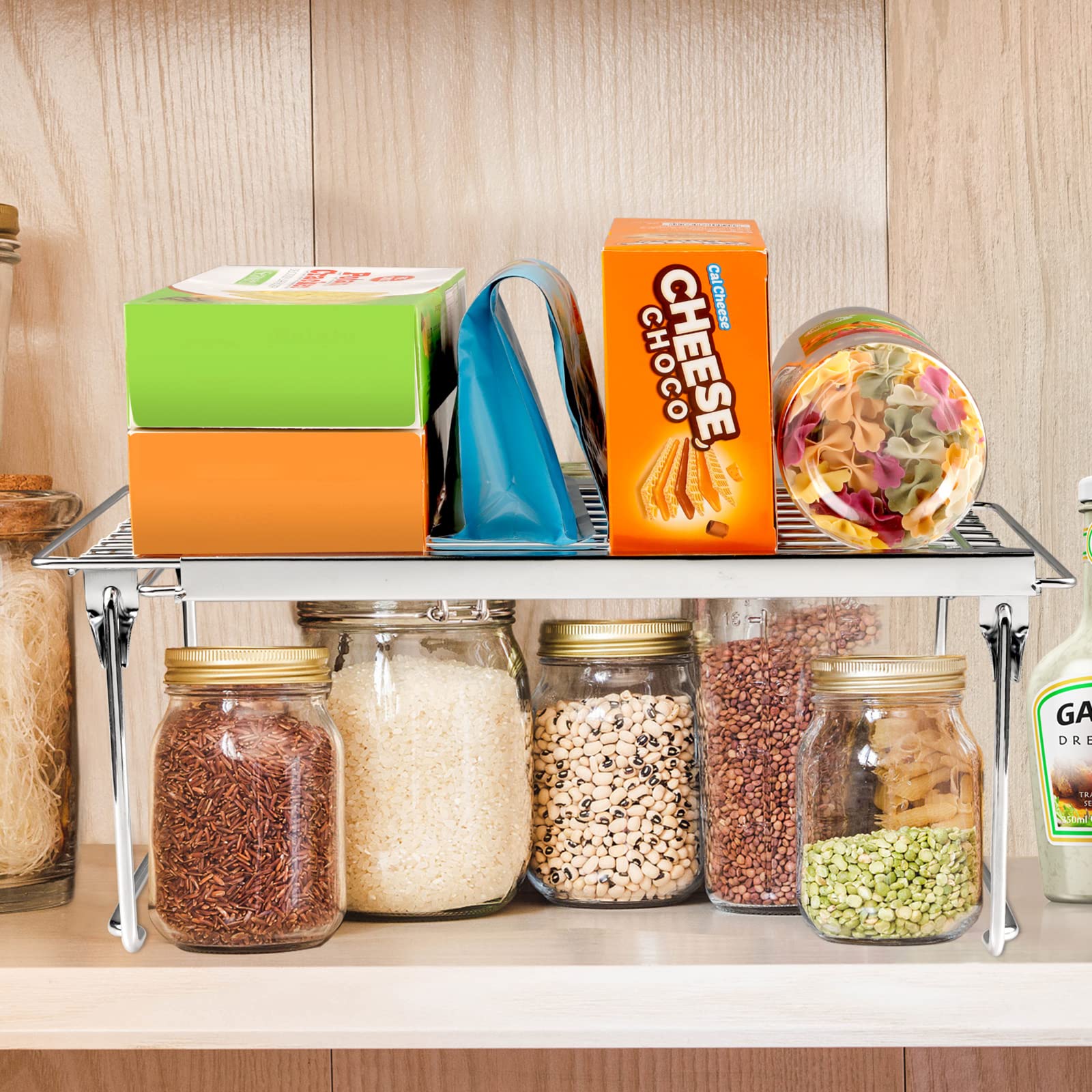 Orgneas expandable shelf keeps spice bottles neatly arranged and accessible.