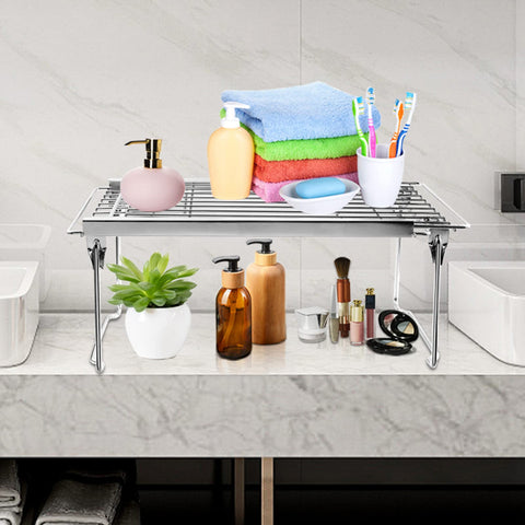 Orgneas expandable shelf fits under-sink spaces for tidy plumbing areas.