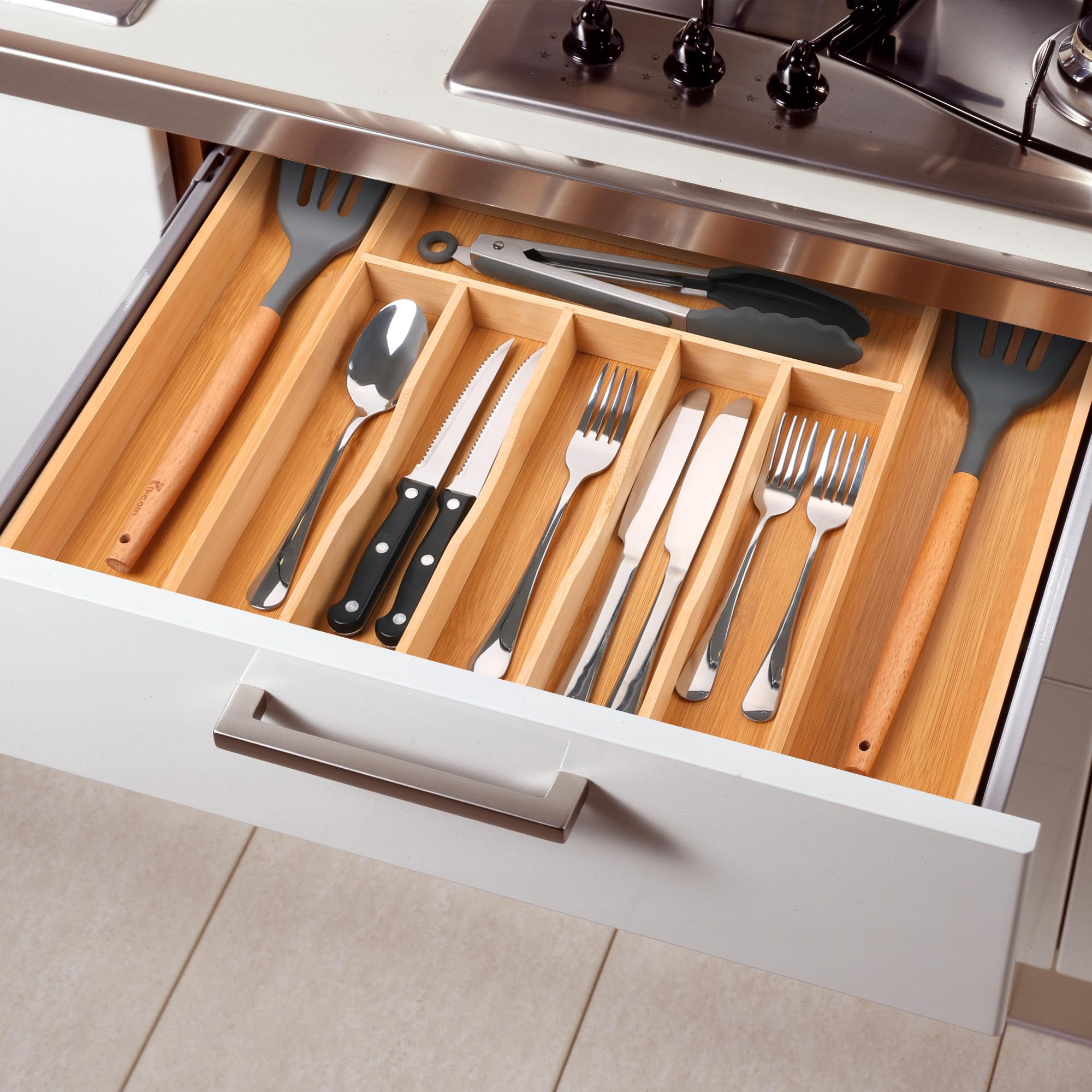 Oridom expandable organizer supports customizable compartments for varied utensil sizes.
