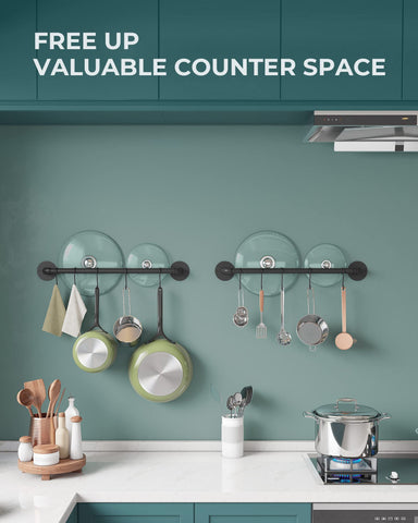 OROPY pots and pans neatly organized on wall rack for easy access