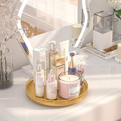 Oroyutor gold vanity tray atop a dresser for organizing perfume