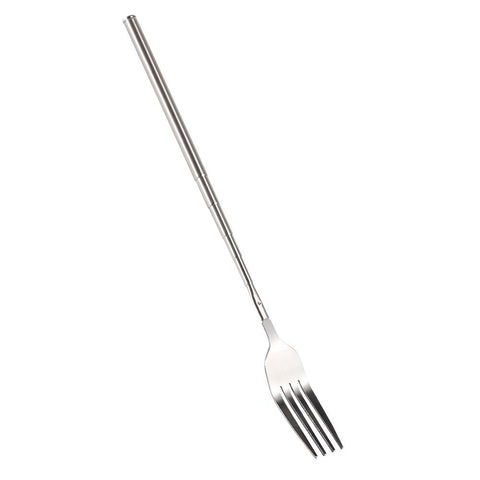 ORULA telescopic handle extended for grilling tasks.