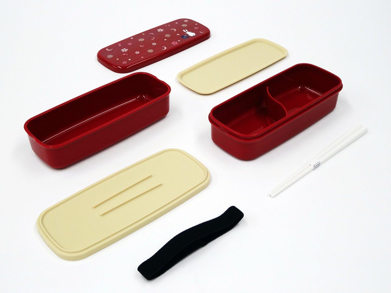 OSK red bento bag with chopsticks supports portable lunches.
