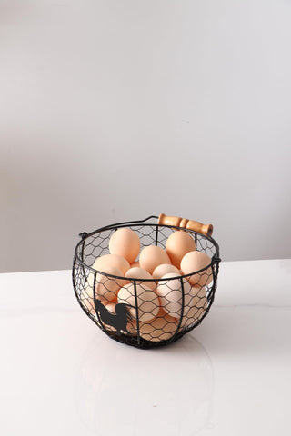 oskas organizer basket with handle eases counter cleanup during gatherings.