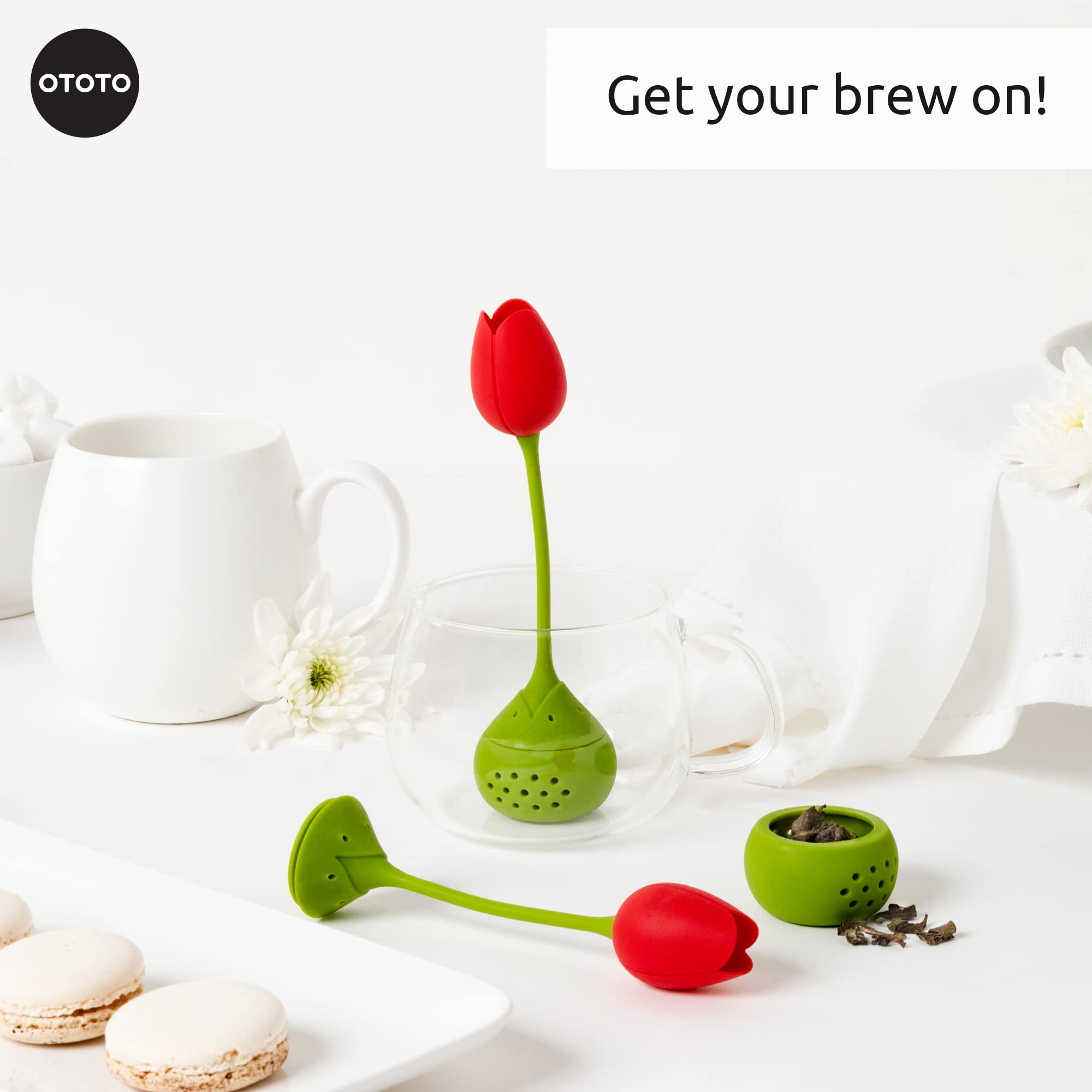 Tulip infuser in action releasing aroma and flavor in cup.