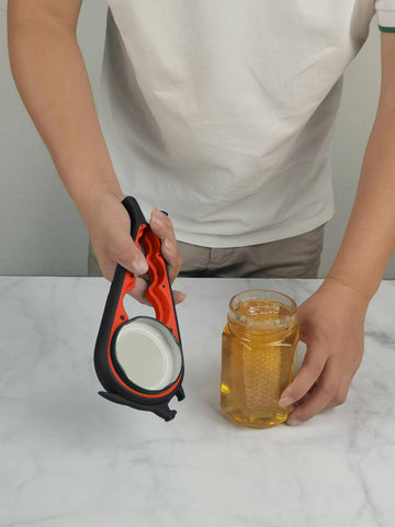 Otstar bottle opener with screw-cap twist for quick removal.