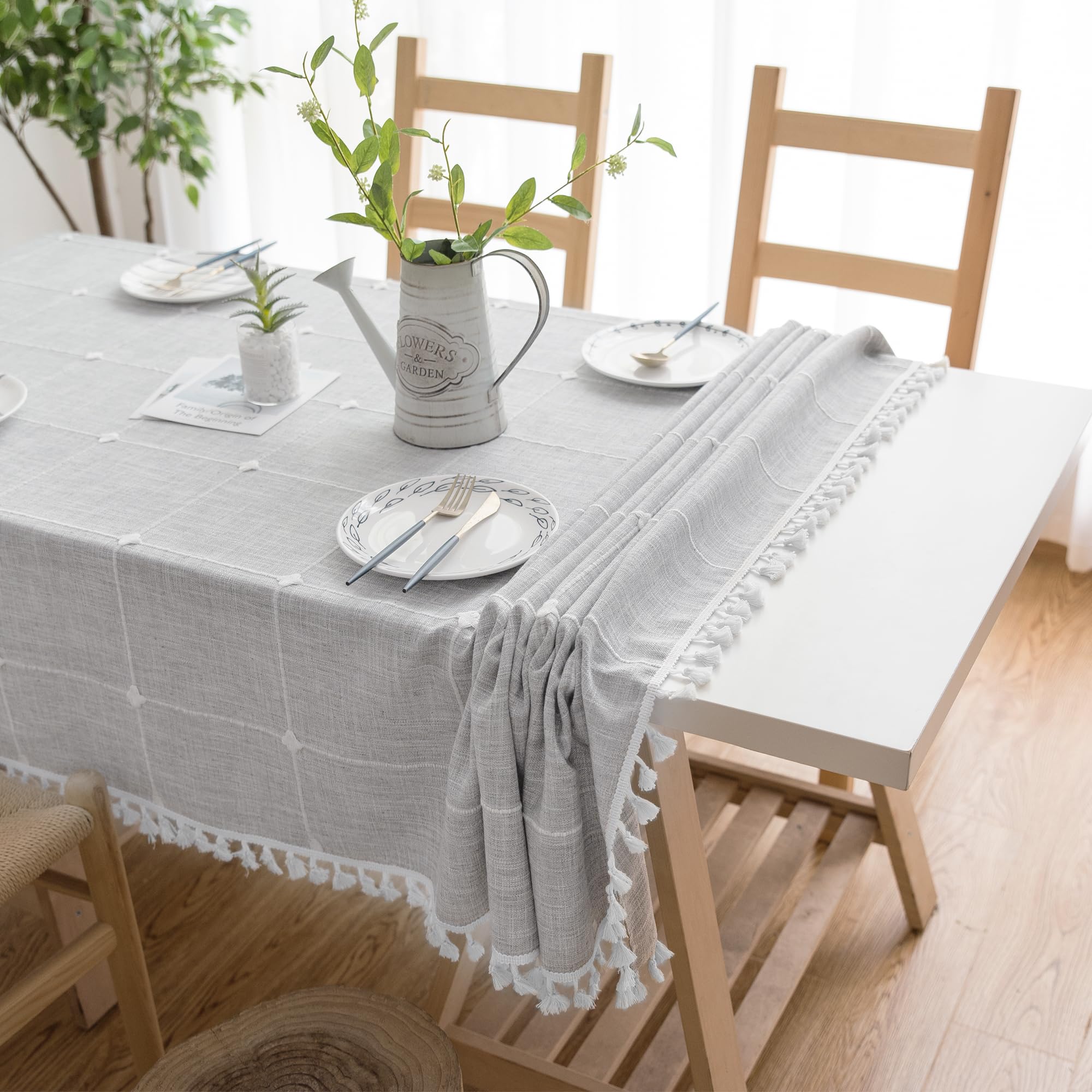 Oubonun grey tablecloth draped on a table for family meals and celebrations