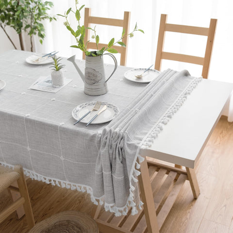 Oubonun grey tablecloth draped on a table for family meals and celebrations