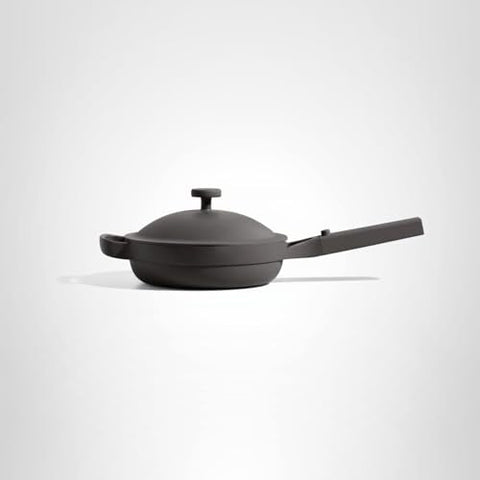 Compact kitchen setup featuring our Place pan in a modern apartment.