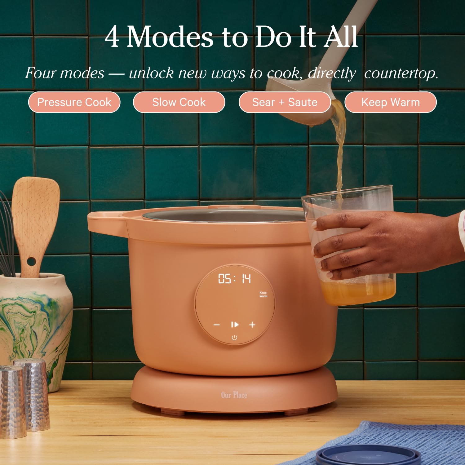 Our Place Dream Cooker auto steam release adds hands-free safety during pressure cooking.