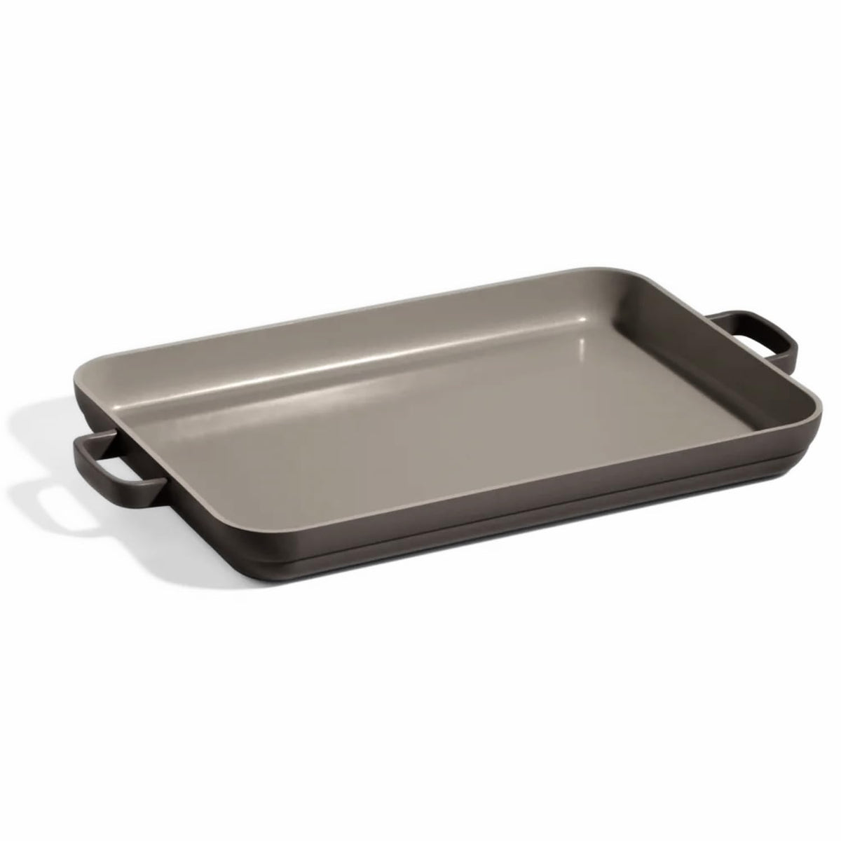 Our Place griddle pan angled view showing dual-function design for sheet pan and griddle.