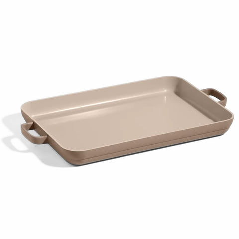 Our Place griddle pan on stovetop demonstrates dual-burner versatility for quick meals.