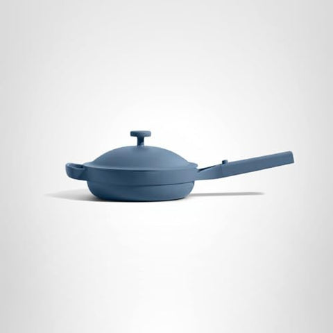 Our Place Mini Always Pan beechwood-spatula nests neatly for convenient cooking.