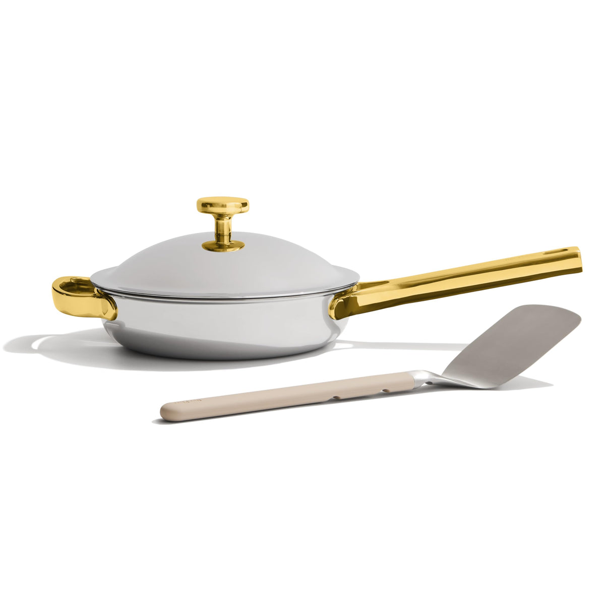 Our Place interior close-up shows the coating-free titanium surface for easier cooking.