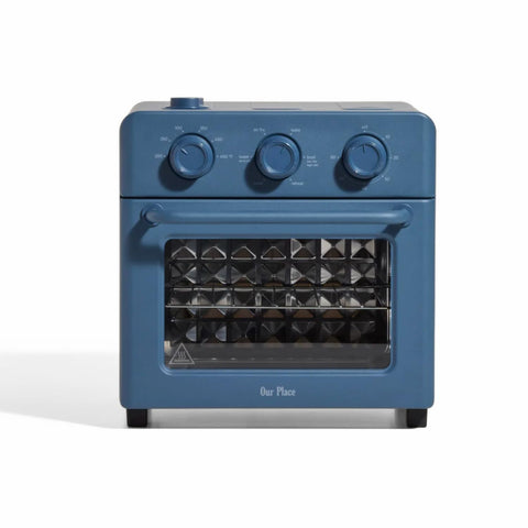 Our Place Wonder Oven front view showing compact 13 qt countertop design and blue-salt finish