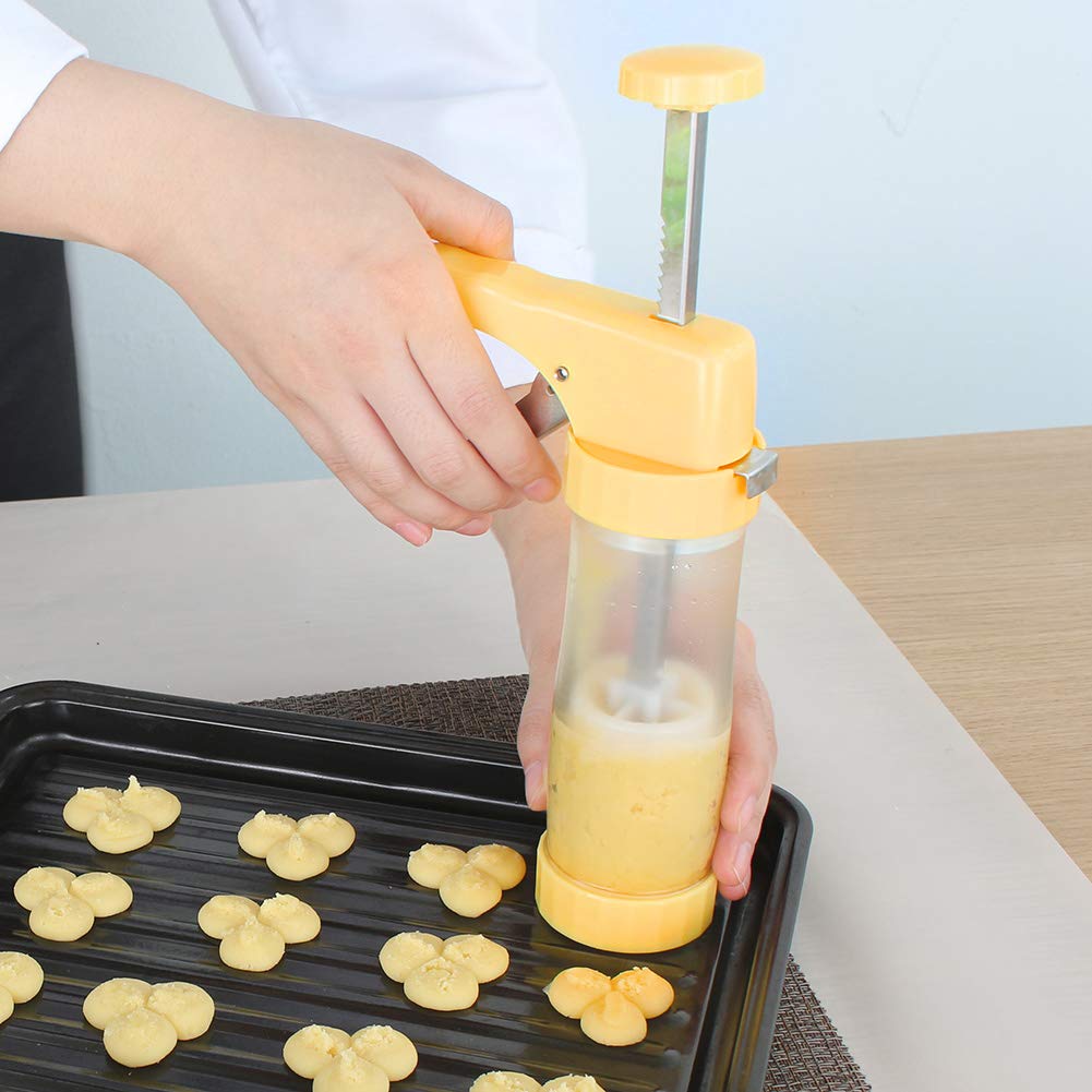 Action shot of Ourokhome press in use for cookies.