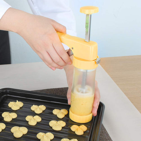 Action shot of Ourokhome press in use for cookies.