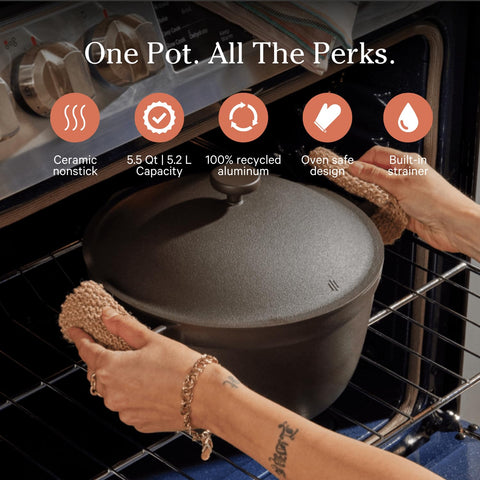 Our Place Perfect Pot lid with steam-release for easy draining.