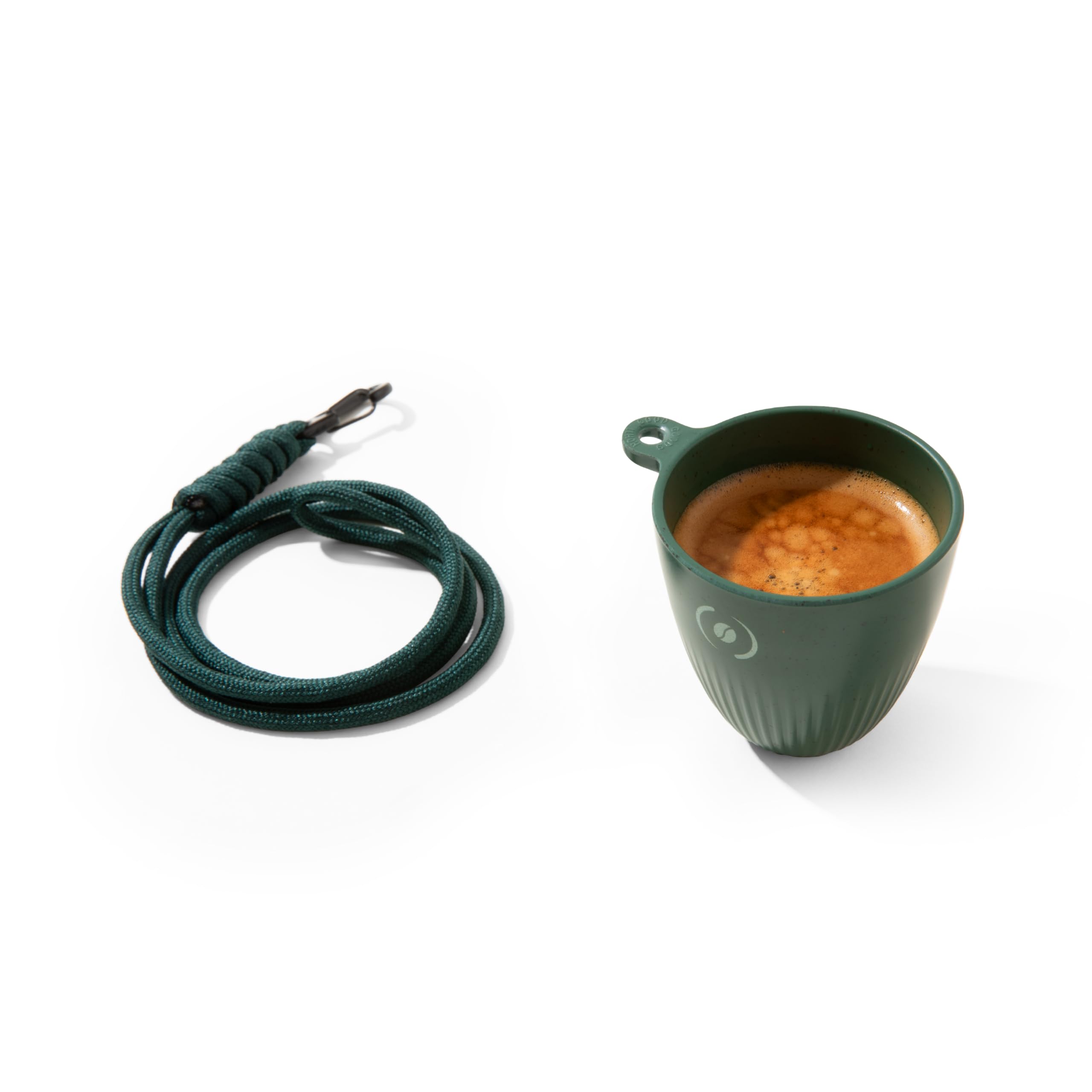 OutIn espresso cup clipped on a bag for on-the-go coffee.