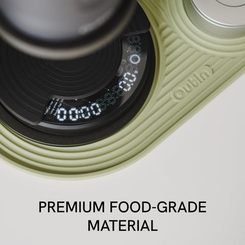 OutIn silicone coffee mat compatible with Nano machines and accessories.