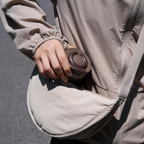 OutIn Travel Tumbler preserves hot beverages for hours with double-wall insulation.