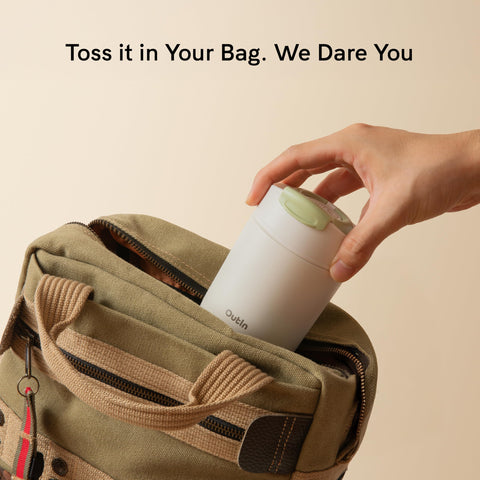 OutIn Travel Tumbler with leak-proof lid secures contents during travel.