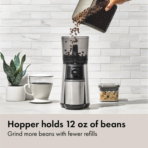 OXO Brew grinder top view emphasizes compact footprint for counters.