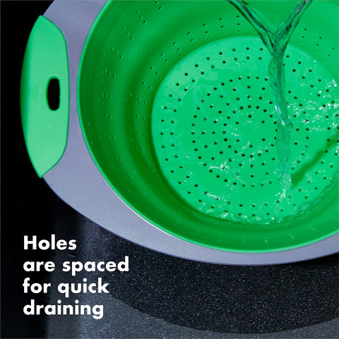 OXO Collapsible Colander draining pasta with heat resistant silicone