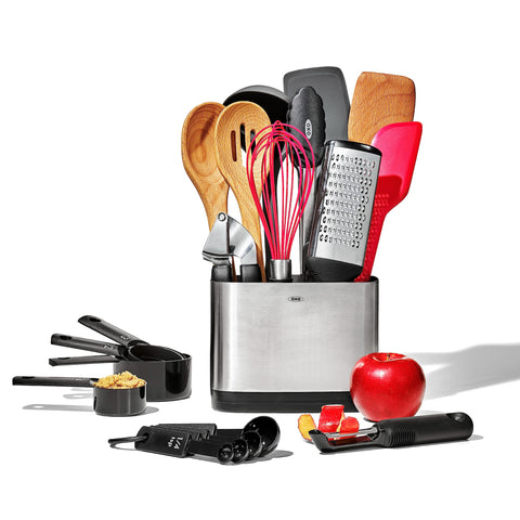 OXO Good Grips 20-piece set displayed on counter for easy cooking prep.