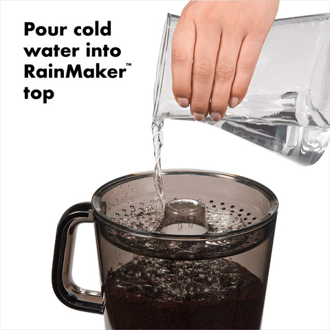 Borosilicate glass carafe with clear measurement markings for precise portioning.