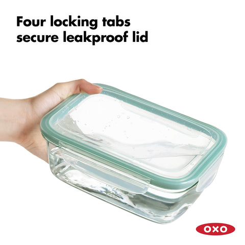 OXO Good Grips 8 Cup Smart Seal glass container showing lid locking tabs for leakproof use
