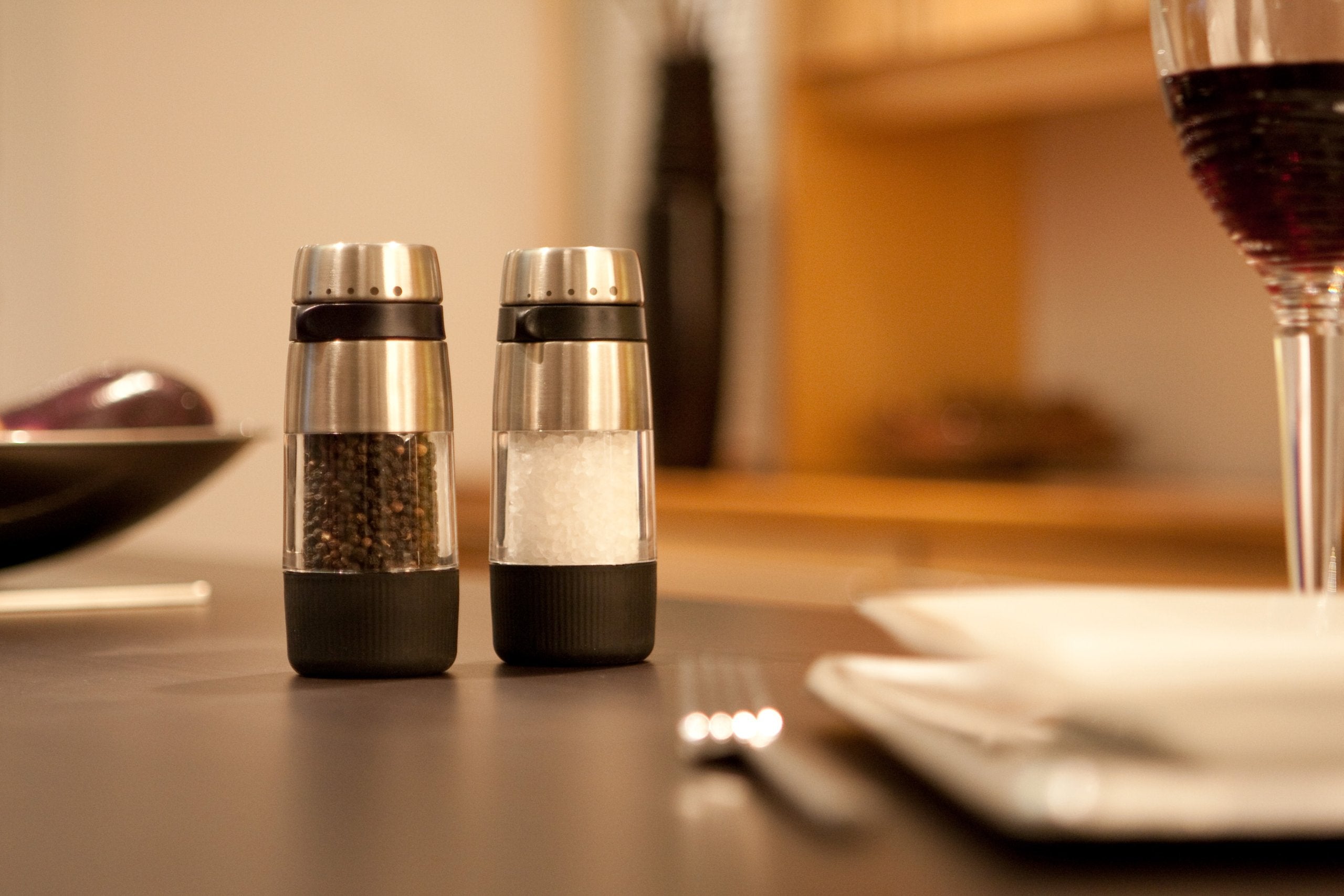 OXO Good Grips Accent Salt Grinder at table setting for precise seasoning during meals