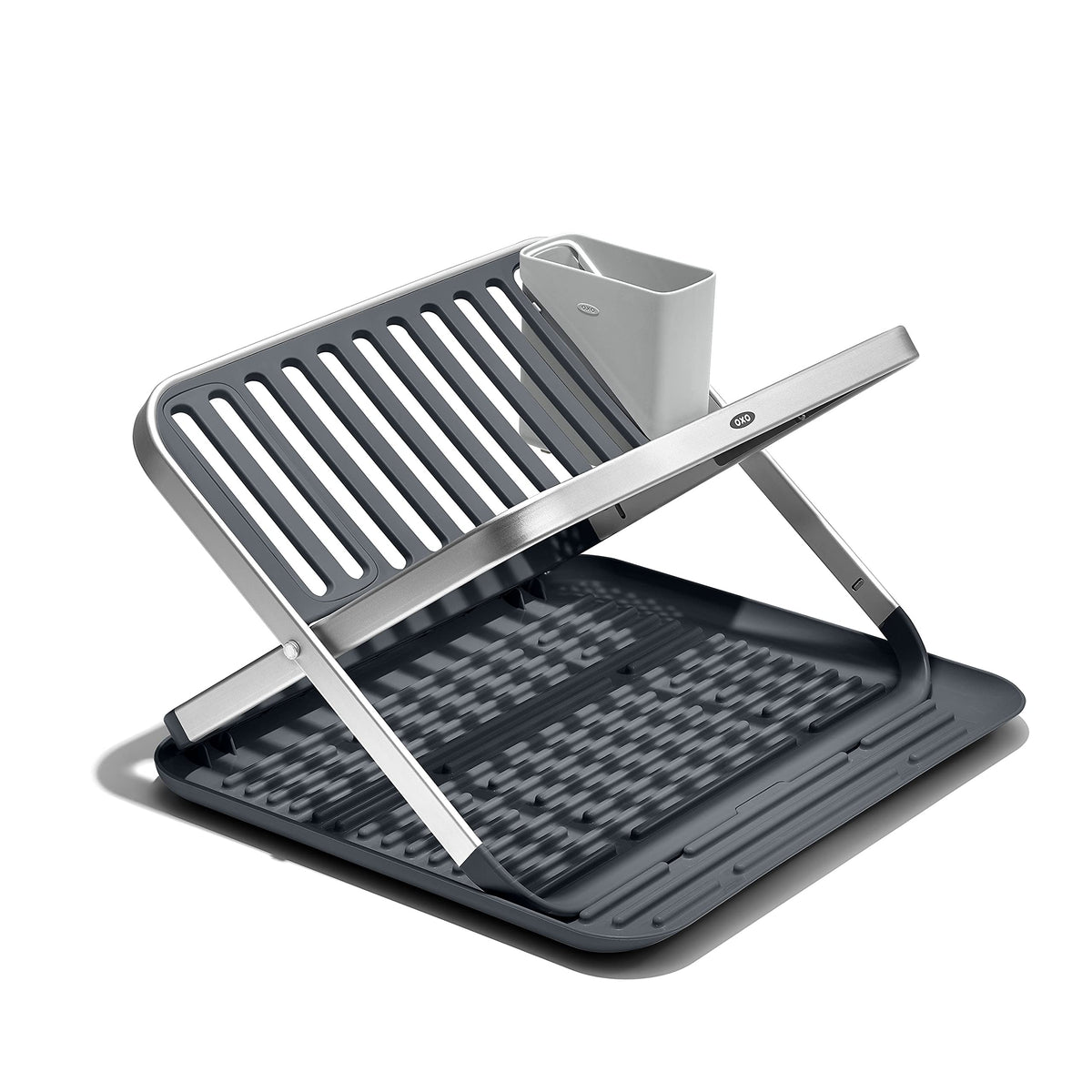 OXO Good Grips aluminum fold-flat dish rack with drainboard demonstrates compact drying efficiency