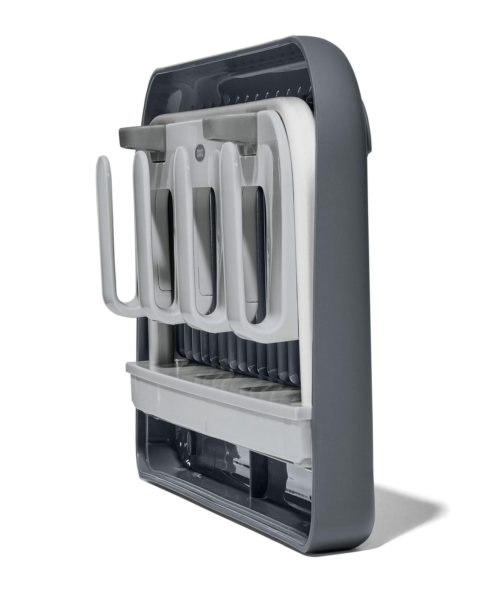 OXO Good Grips drying rack disassembled for compact storage in the base