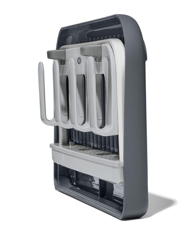 OXO Good Grips drying rack disassembled for compact storage in the base