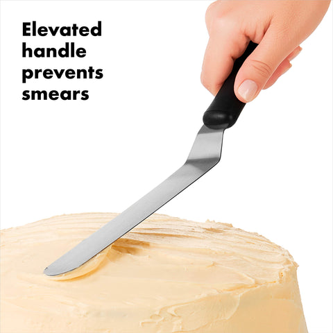 OXO Good Grips Bent Icing Spatula angled blade for elevated hand clearance.