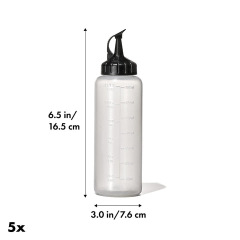 OXO Good Grips squeeze bottle with attached cap open for pouring or shaking