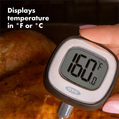 Oxo Good Grips thermometer with probe cover and built-in charts for reference.