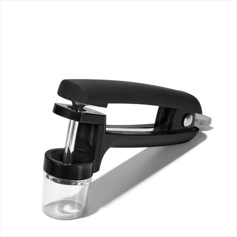OXO Good Grips Cherry and Olive Pitter with black handle offers a secure non-slip grip.