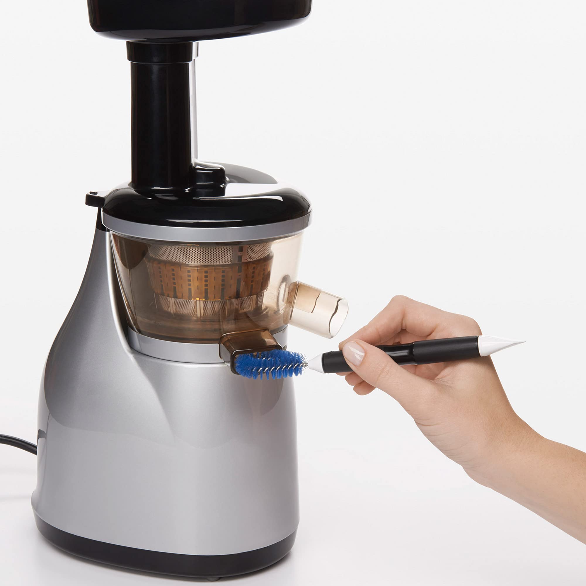 OXO Good Grips angled brush reaches grout lines and fixtures easily